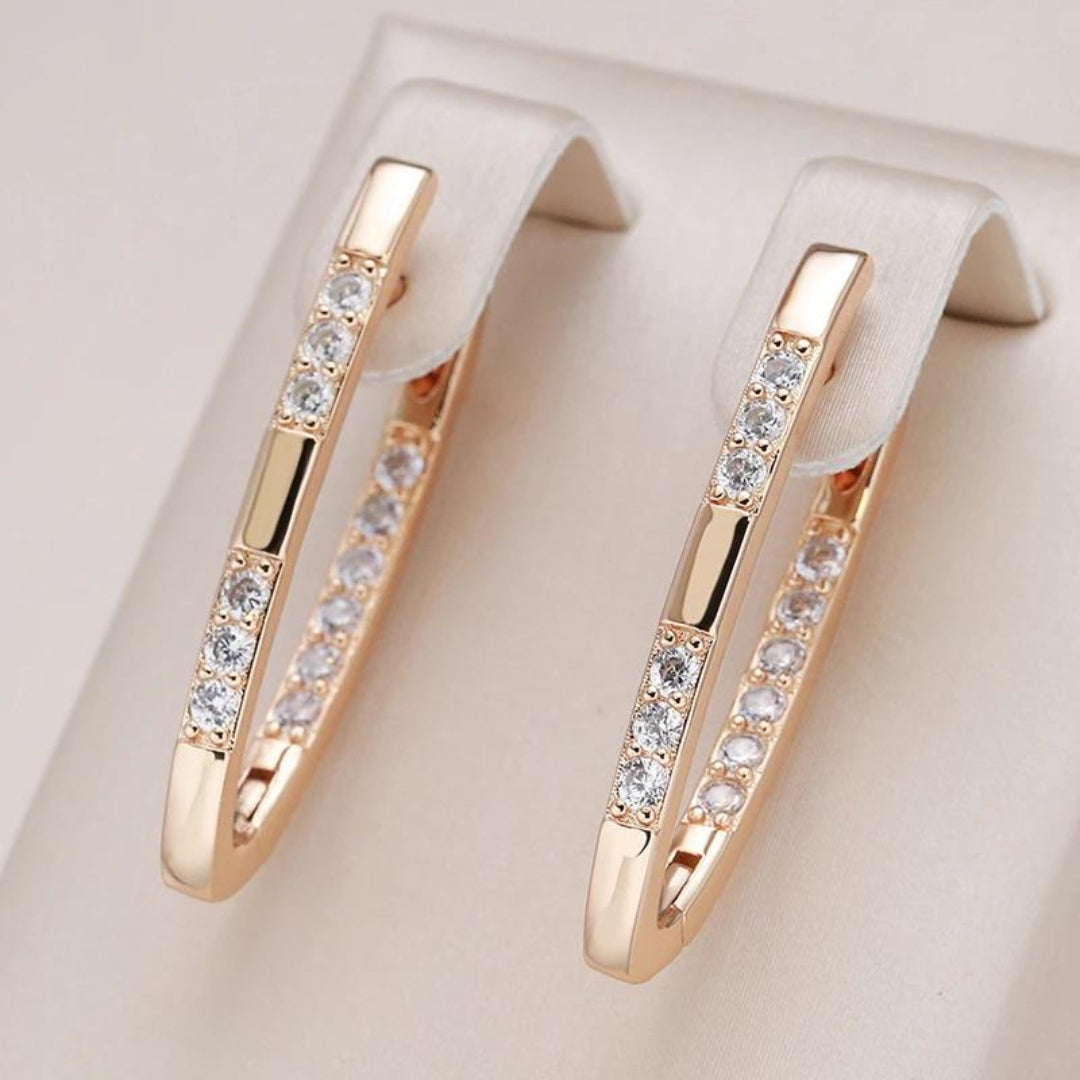 Elegante zirkonøreringe i guld