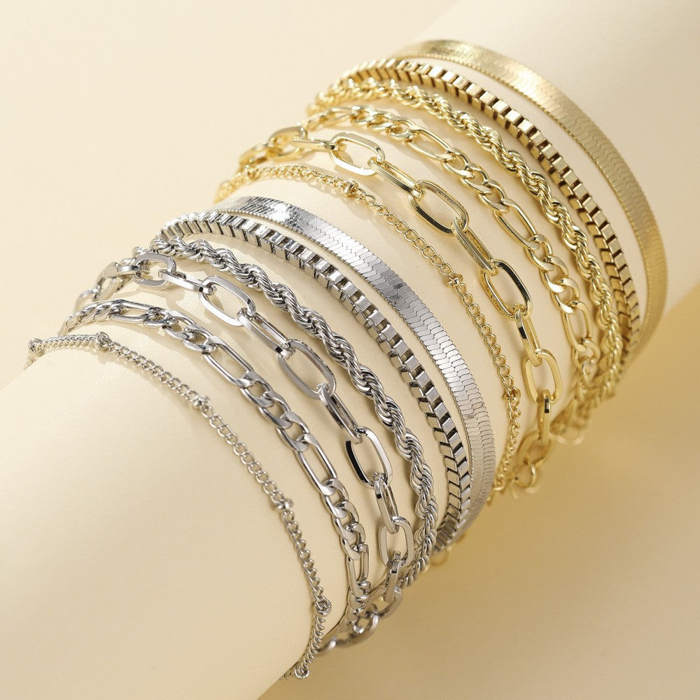 Sæt af Armbånd i Guld
