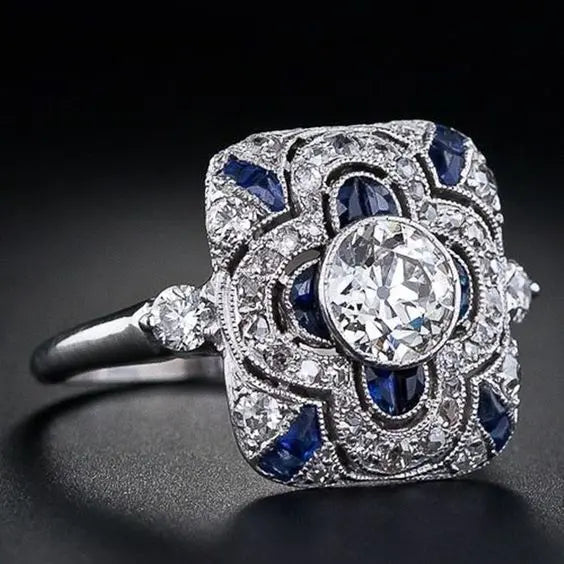 Vintage ring i sølvfarve med blå zirkonium